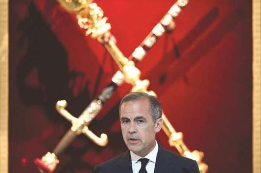 BoE governor Mark Carney delivers his re-scheduled speech to the Bankers and Merchants of the City of London at The Mansion House in London yesterday. Sterling slid by more than half a cent after Carney distanced himself from three other BoE rate-setters who said last week that rates should start to rise for the first time in a decade.