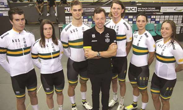 Cycling Australiau2019s director Simon Jones (centre) with his team-members.