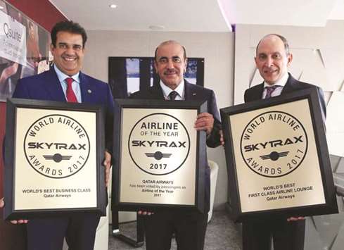 HE al-Sulaiti (centre) with al-Baker and al-Mansouri following the Skytrax awards winning by Qatar Airways at the Paris Air Show.