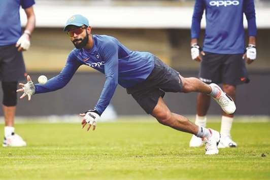 India captain Virat Kohli takes part in a practice session at Queenu2019s Park Oval in Port of Spain, Trinidad, yesterday. (AFP)