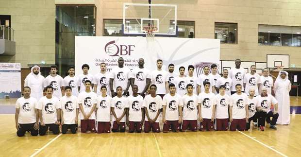 Qataru2019s senior and junior basketball players sport T-shirts expressing solidarity with His Highness the Emir Sheikh Tamim bin Hamad al-Thani at a training session at the Al Gharafa Sports Club yesterday.
