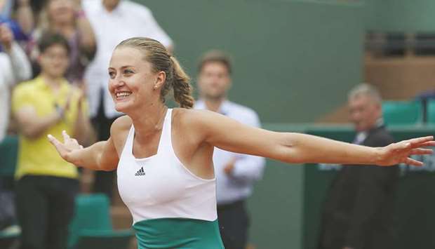 Franceu2019s Kristina Mladenovic reacts after winning her match against US Shelby Rogers at the Roland Garros French Open in Paris yesterday. (AFP)