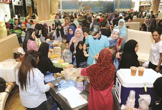 Visitors of the annual Malaysian Ramadan Bazaar line up to buy some of the food on offer during the event. PICTURE: Shemeer Rasheed