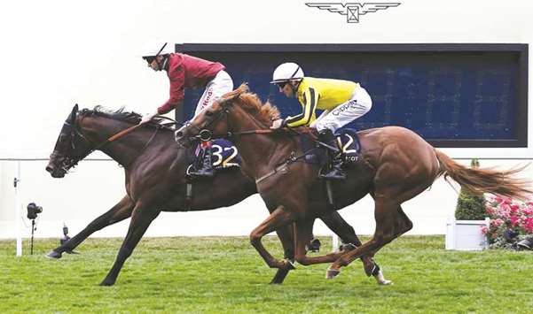 Qatar Racingu2019s Jamie Spencer wins the 5.00 Britannia Stakes on Bless Him at Ascot yesterday.
