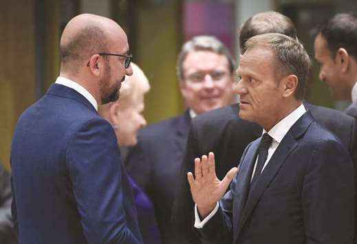 DREAMER AND NON-DREAMER: Belgian Premier Michel (left) and European Council President Tusk speak yesterday in Brussels.