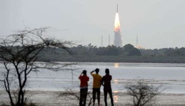 An Indian PSLV rocket carrying an Earth observation satellite along with 30 other nano satellites launches from the Sathish Dawan Space Station at Sriharikota in Andhra Pradesh on Friday.