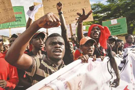This file photo taken on May 26 shows protesters at a demonstration in Accra dubbed u2018Fabewoso u2013 Bring it onu2019 to raise awareness about the high rate of corruption in the country.