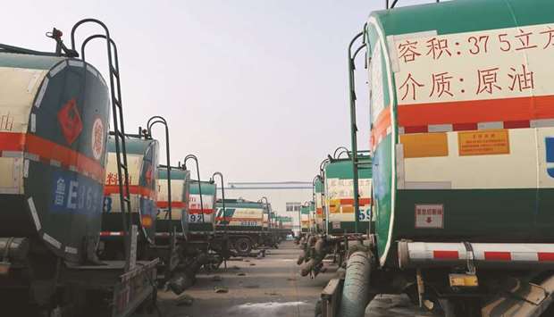 Oil tankers are seen in Dongying, Shandong province. A fuel glut in China, a hangover from demonetisation in India, and an ageing, declining population in Japan are holding back crude oil demand growth in three of the worldu2019s top four oil buyers.