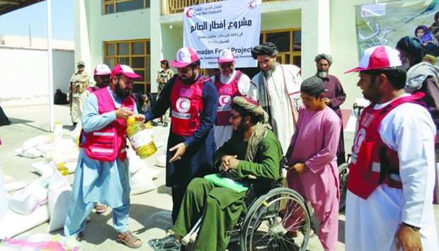 QRCS distributes food packages to disabled people in Afghanistan.