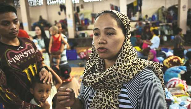 Rasmia Abdullah, 24, speaks during an interview at an evacuation centre outside Marawi in Balo-in.