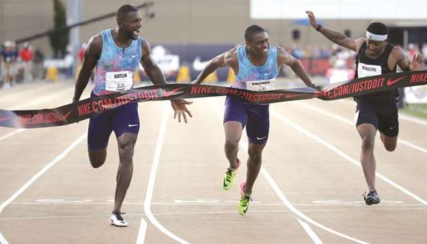 Justin Gatlin (left) celebrates as he wins the menu2019s 100m final ahead of Christian Coleman during the USA Track & Field Championships in Sacramento, California, on Friday. (AFP)