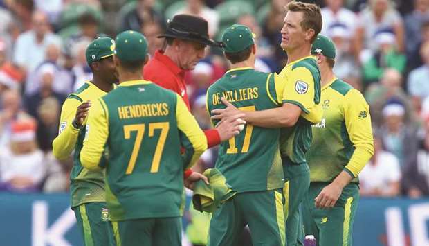 South Africa all-rounder Chris Morris (second right) celebrates with teammates after taking the wicket of Englandu2019s Sam Billings during the second Twenty20 match at the Cooper Associates County Ground in Taunton, south-west England, on Friday. (AFP)