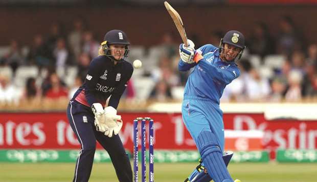 Indiau2019s Smrti Mandhana (right) in action against England yesterday. (Reuters)