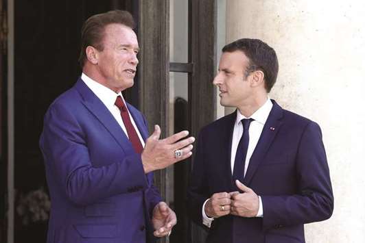 Macron with Schwarzenegger after their meeting at the Elysee Palace on Friday.