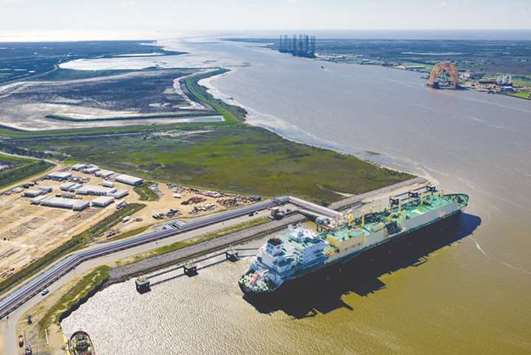 The Asia Vision LNG carrier sits docked at the Cheniere Energy terminal in this aerial photograph taken over Sabine Pass, Texas on February 24, 2016. Since starting up last year, Cheniereu2019s terminal in Louisiana u2013 the first major facility sending shale gas overseas u2013 has shipped more than 100 cargoes of LNG to countries including Mexico, China and Turkey.