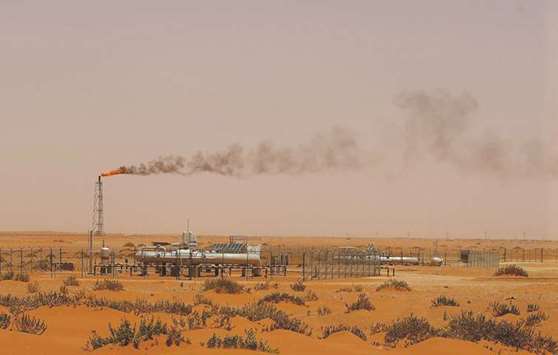 A picture taken on June 23, 2008 shows a flame from a Saudi Aramco oil facility known as u201cPump 3u201d in the desert near the oil-rich area of Khouris, 160km east of the Saudi capital Riyadh. While two-thirds the $140bn GCC fiscal deficit in 2017 projected by the IIF is attributable to Saudi Arabia, deficits remain large as a proportion of GDP in Bahrain and Oman.