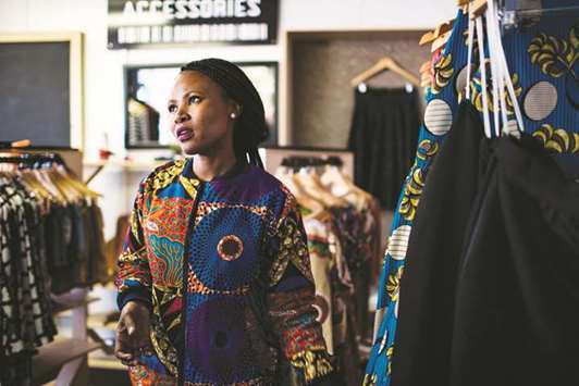Designer Mandisa Zwane of u2018Kwande u2014 Love My Printu2019 talks to AFP at The Box Shop on Vilakazi Street in Soweto.