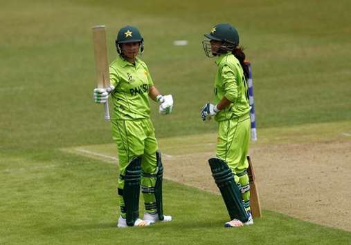 Pakistanu2019s Bibi Nahida raises her bat after reaching 50 runs during the Womenu2019s World Cup match against South Africa in Leicester yesterday. (Reuters)