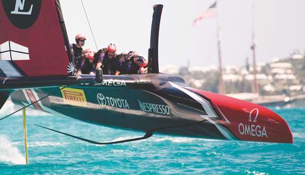 Team New Zealand crosses the finish line of the second race of the day against Oracle Team USA  in the Great Sound during the 35th Americau2019s Cup in Hamilton, Bermuda.