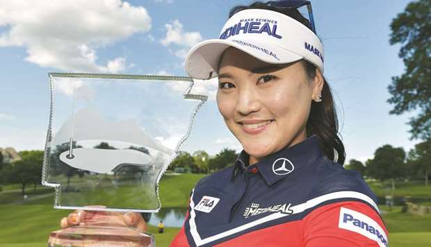 Ryu So-Yeon of South Korea displays her trophy after winning the Walmart NW Arkansas Championship Presented by P&G at Pinnacle Country Club in Rogers, Arkansas.