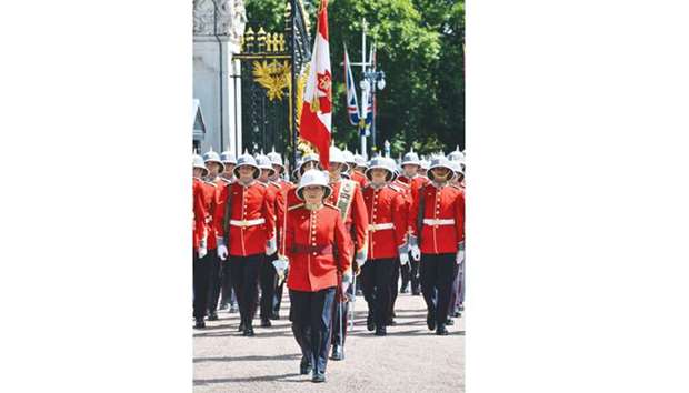 Captain Megan Couto (centre) of the 2nd Battalion, Princess Patriciau2019s Canadian Light Infantry (PPCLI) leads her battalion to make history as the first woman to command the Queenu2019s Guard at Buckingham Palace in central London yesterday.