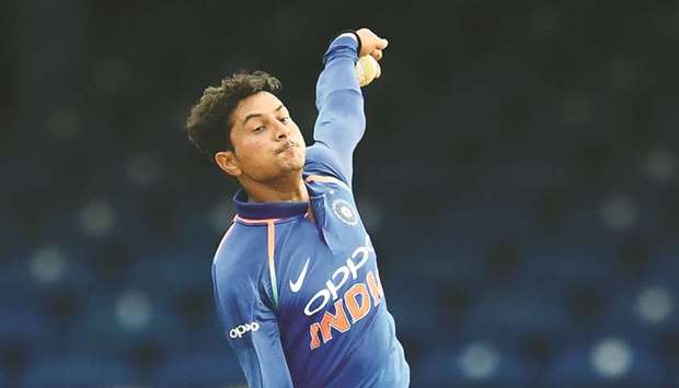 India chinaman bowler Kuldeep Yadav delivers a ball during the second ODI against the West Indies at the Queenu2019s Park Oval in Port of Spain, Trinidad, on Sunday. (AFP)