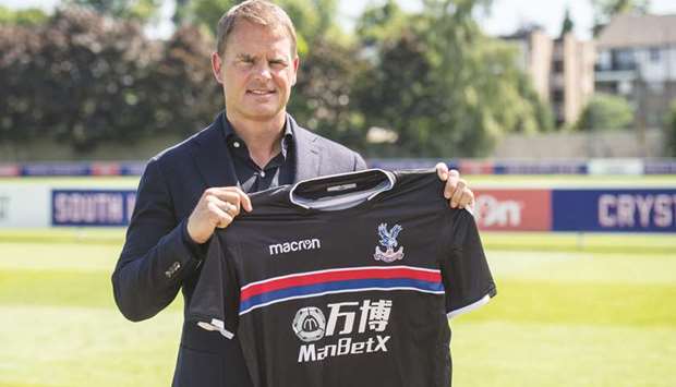 Former Dutch great Frank de Boer poses as he is unveiled as the new manager of Crystal Palace in London yesterday. (AFP)