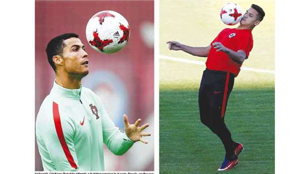 Portugalu2019s Cristiano Ronaldo attends a training session in Kazan, Russia, on the eve of the Confederations Cup semi-final against Chile. Right: Chileu2019s Alexis Sanchez training in Kazan, Russia, yesterday. (AFP/Reuters)