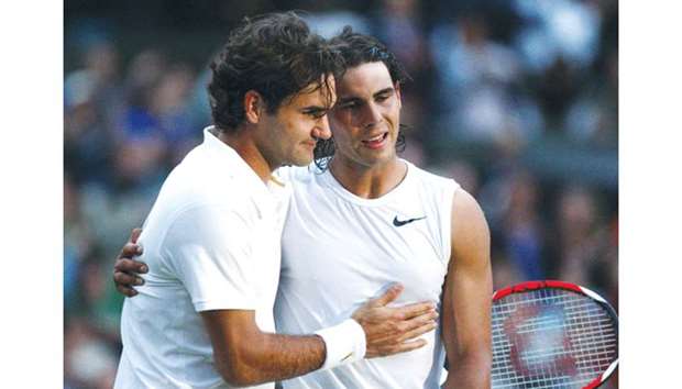 In this July 6, 2008, picture, Rafael Nadal of Spain (right) and Roger Federer of Switzerland embrace after their finals match at Wimbledon in London. Nadal had won 6-4, 6-4, 6-7 (5), 6-7 (8), 9-7. (Reuters)