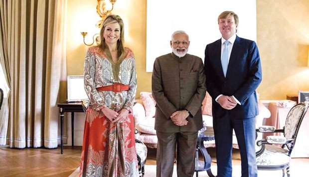Queen Maxima and King Willem Alexander of the Netherlands pose for a photograph with Prime Minister Narendra Modi at Villa Eikenhorst in Wassenaar, The Netherlands yesterday.