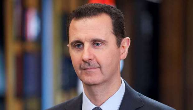 Syria's President Bashar al-Assad speaks during an interview in Damascus, on September 26, 2013