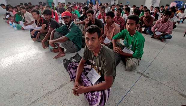 Suspected Rohingya migrants from Myanmar and Bangladesh rest at Rattaphum district hall in Thailand's southern Songkhla province. File picture:  May 9, 2015