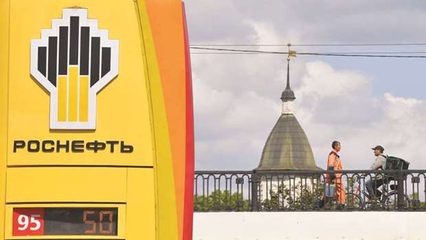 The logo of Russian oil giant Rosneft is seen at a petrol station in Moscow yesterday. A wave of cyber attacks hit Russia and Ukraine before spreading to western Europe and North America on Tuesday, in the second global outbreak of so called ransomware in less than two months. Rosneft was among the victims along with a string of multinational companies.