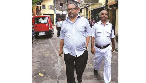 Narada News CEO Mathew Samuel arrives at Muchipara police station in Kolkata yesterday.