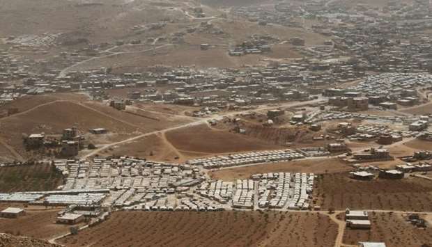 A general view shows Syrian refugee camps dotted in and around the Lebanese town of Arsal, near the border with Syria, Lebanon.