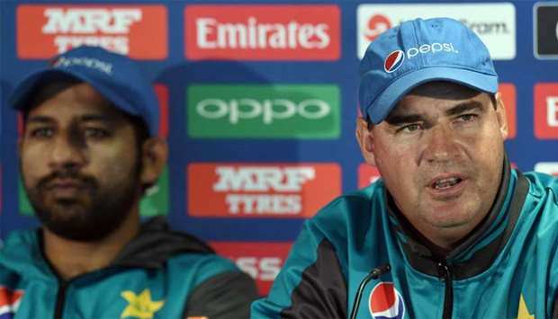 Pakistan coach Mickey Arthur (R) and captain Sarfraz Ahmed