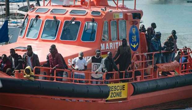 A group of people arrive at the Algeciras port after being rescued by the Salvamar Atria Salvage ves