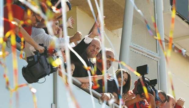 Muscat acknowledges his supporters from the balcony of his party headquarters in Hamrun after winning a second term in office in Maltau2019s snap general elections.