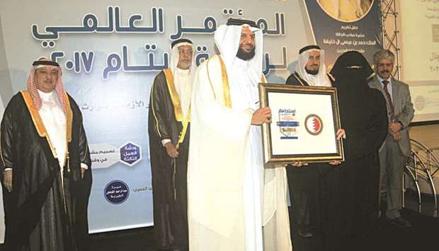 Sheikha al-Anoud bint Mohamed al-Thani, Director of Health Promotion and Non-communicable Diseases at the Ministry of Public Health, receiving the honour in Manama recently.