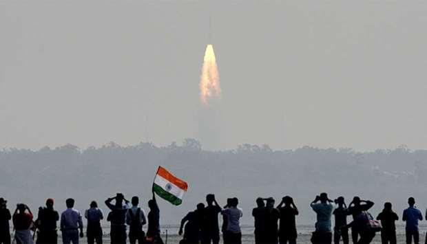 people watching the launch of the ISRO Polar Satellite Launch Vehicle