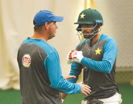 Pakistanu2019s coach Mickey Arthur (left) speaks to batsman Babar Azam during a training  session at Edgbaston. (Reuters)