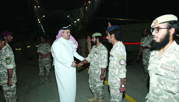 HE the Minister of State for Defence Affairs Dr Khalid bin Mohamed al-Attiyah welcoming the Qatari Armed Forces troops upon their return from Najran.