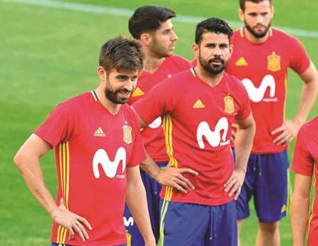 Spainu2019s Diego Costa (right) and Gerard Pique during a training session. (AFP)