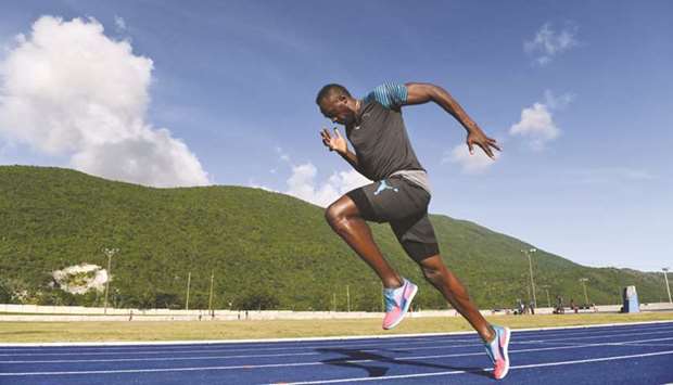 Usain Bolt of Jamaica trains at the University of West Indies in Kingston. (AFP)