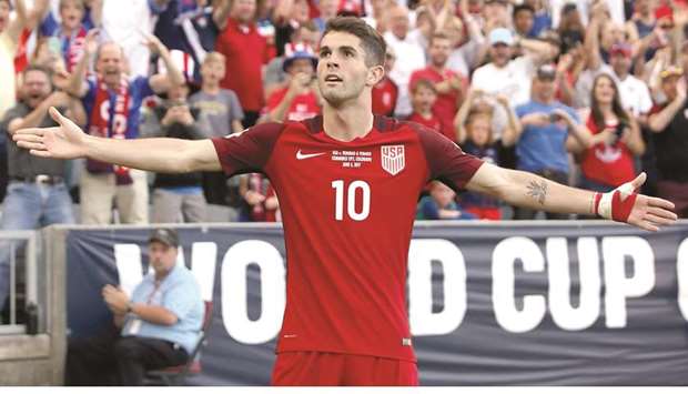 USAu2019s Christian Pulisic celebrates after scoring.