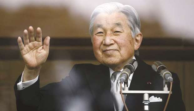 In this file picture, Emperor Akihito waves to well-wishers at the Imperial Palace in Tokyo.