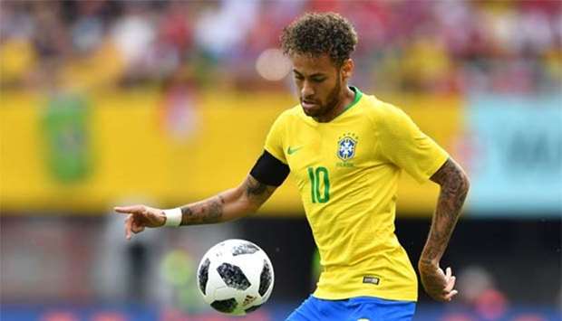 Brazil's Neymar eyes the ball during the friendly against Austria in Vienna on Sunday.