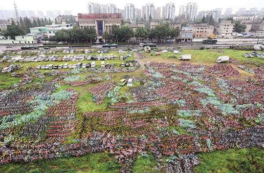 CROWDED: Thousands of bicycles from the rental company Hangzhou Public Bicycle crowded together in a meadow in the city of Hangzhou. Rental bicycles are booming in China.