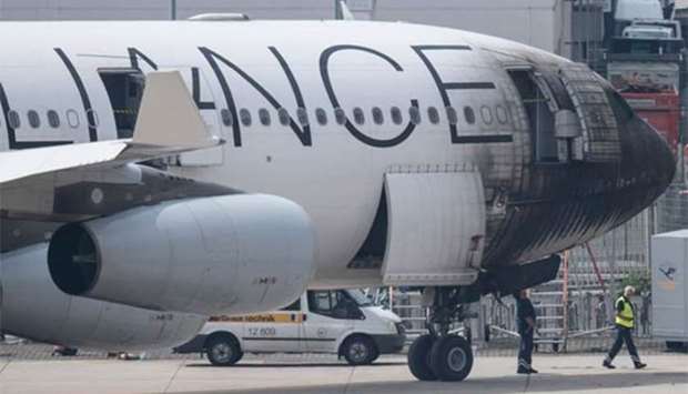 The blackened and heavily damaged cockpit area of a Star Alliance passenger aircraft is pictured at Frankfurt airport on Monday.