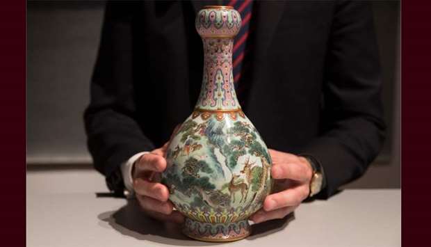 Rare Imperial Qianlong porcelain vase (18th century) is displayed at Sotheby's auction company in Paris